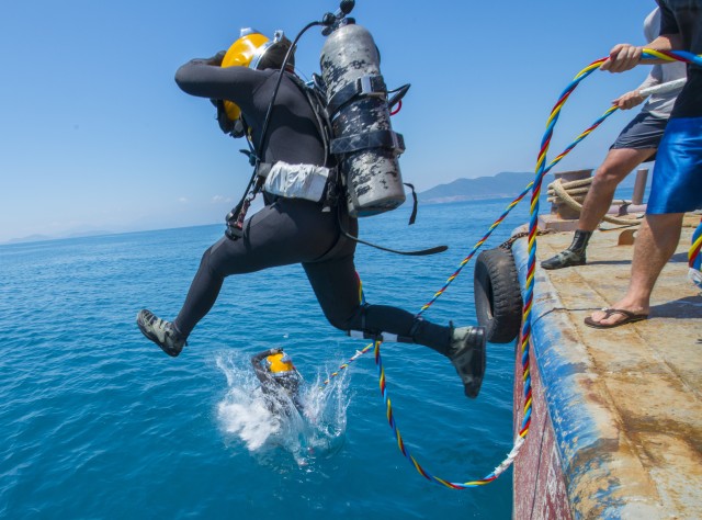 For Army divers, excavating underwater tombs is a solemn, honorable duty