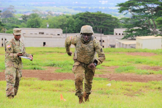 RHC-P Soldier sprints in PT portion of Best Warrior Competition