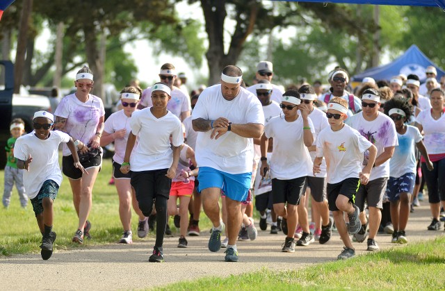 Nearly 300 runners participated in the Directorate of Family and Morale, Welfare and Recreation's Rainbow Road Run May 12 to add a bit of color to their weekend.