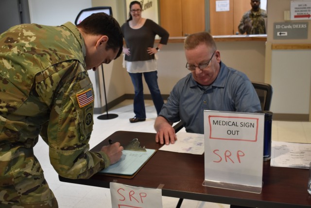 Fort Drum civilian workforce assists 2BCT Soldiers with rapid deployment exercise