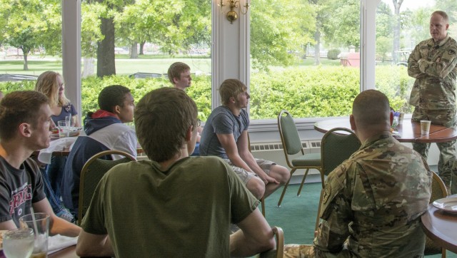 Army recruits embrace military team at RIA