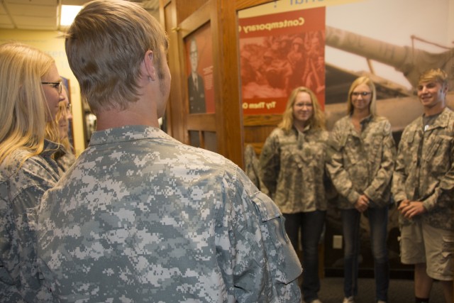 Army recruits embrace military team at RIA