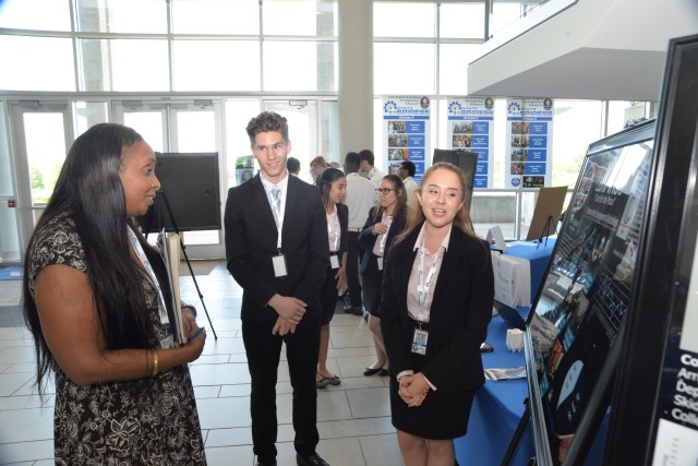 Internal Review chief volunteers for UAH's STEM outreach program