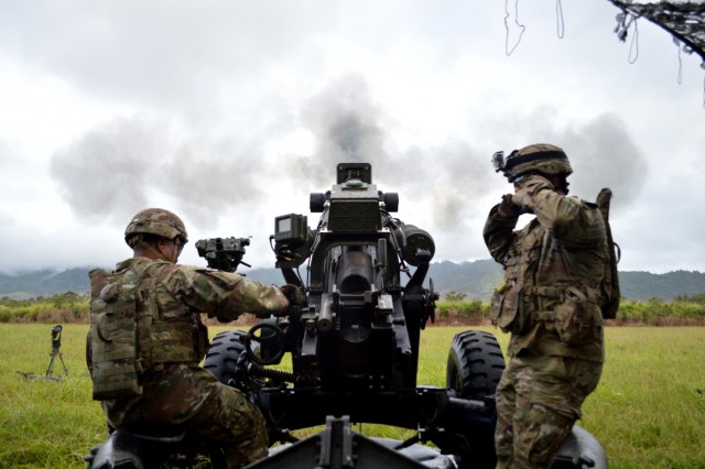 Soldiers fire artillery during Tiger Balm 18 live fire exercise