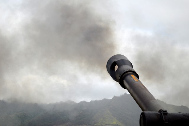 Soldiers fire artillery during Tiger Balm 18 live fire exercise