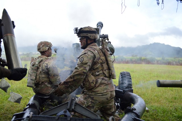 Soldiers fire artillery during Tiger Balm 18 live fire exercise