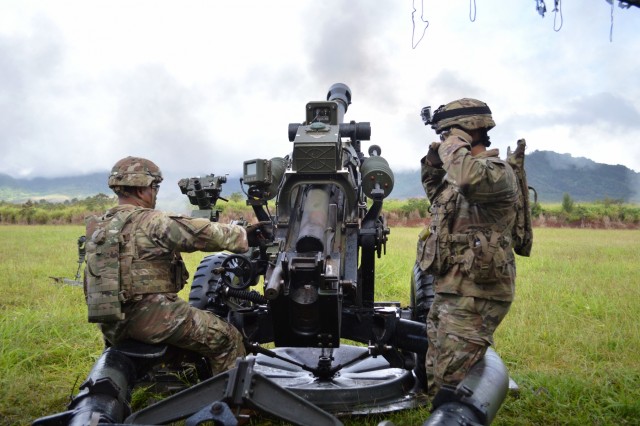 Soldiers fire artillery during Tiger Balm 18 live fire exercise