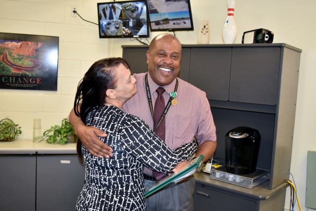Henry Jackson of the Supply and Services Division, Logistical Support Center, Fort Riley, Kansas, received the Contracting Officer Representative of the Quarter June 1 — the first award of its k