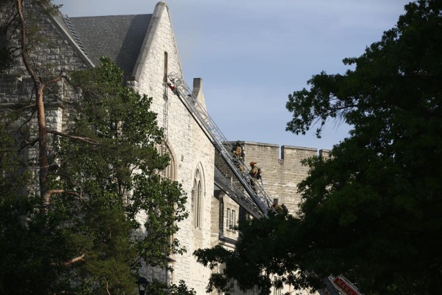 Firefighters for the Fort Riley Fire Emergency Services helped their counterparts from Manhattan, Kansas, battled a fire May 22.