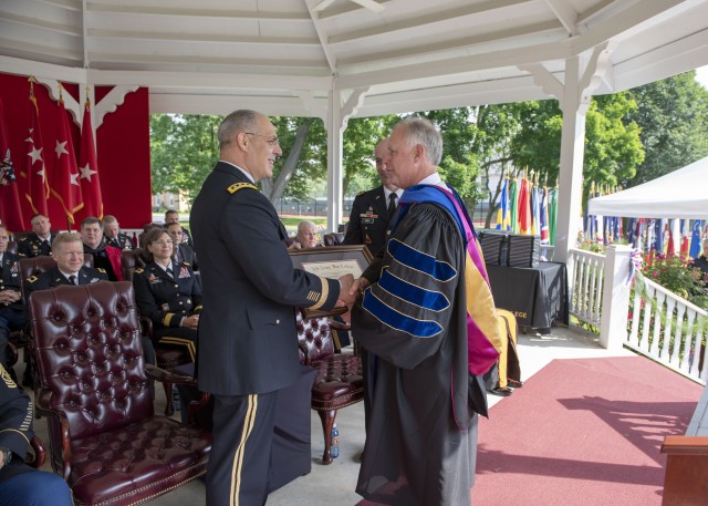 Gen. Gus Perna presented with honorary AWC diploma