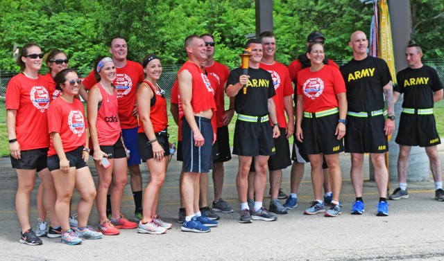 Members of the 97th Military Police Battalion, USAG Fort Riley, participated in the Special Olympic Flame of Hope as it traveled thrfough the area May 31.