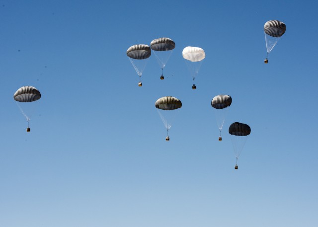 Airborne testers conduct airdrop tests of new container delivery system