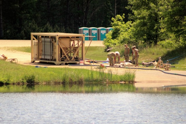 Soldiers set up ROWPU for CSTX 86-18-04 operations at Fort McCoy