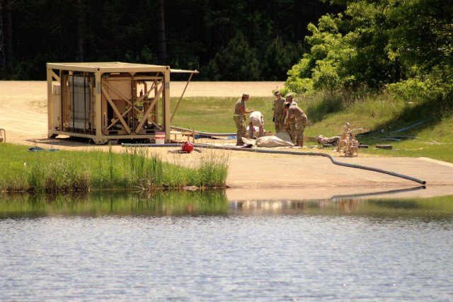 Soldiers set up ROWPU for CSTX 86-18-04 operations at Fort McCoy