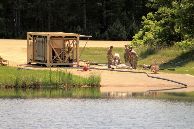 Soldiers set up ROWPU for CSTX 86-18-04 operations at Fort McCoy