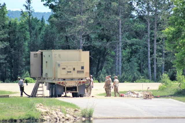 Soldiers set up ROWPU for CSTX 86-18-04 operations at Fort McCoy