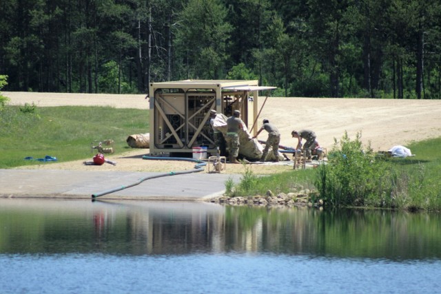 Soldiers set up ROWPU for CSTX 86-18-04 operations at Fort McCoy