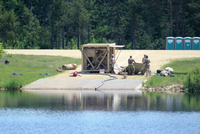 Soldiers set up ROWPU for CSTX 86-18-04 operations at Fort McCoy