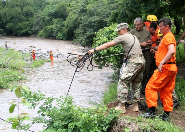 NHARNG teamed with Salvadoran soldiers and firefighters for swift-water training