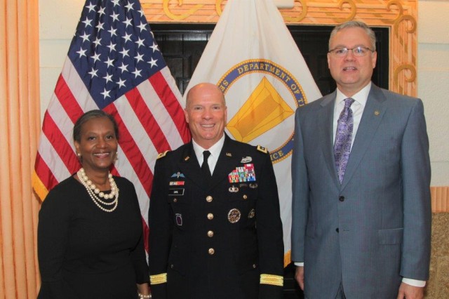 Lt. Gen. Kenneth Dahl (center), commanding general, U.S. Army Installation Management Command, welcomes IMCOM's two new tier-two Senior Executive Service leaders