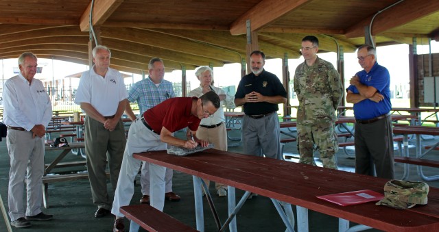 Smith Island United President Signs Piece of Jetty Stone