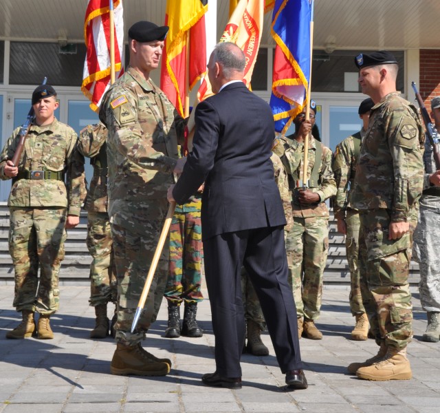 Mr. Formica passes colors to Col. Sean Hunt Kuester