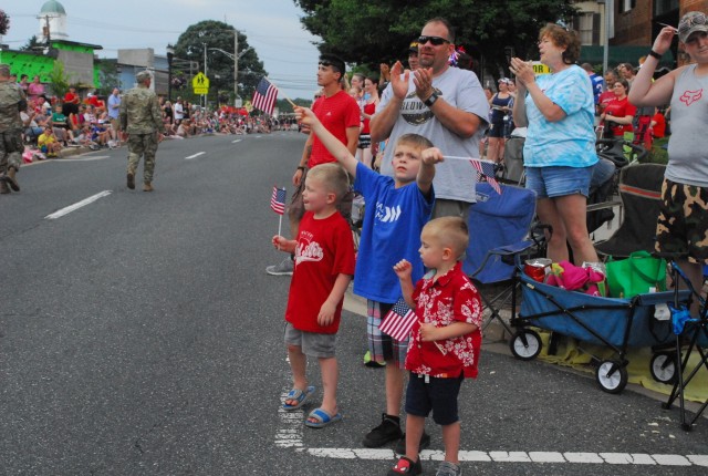 Boys wave flags