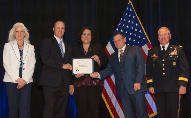 Armored Fight Vehicle Employees Accept DOD Value Engineering Award