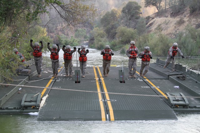 California Guard build temporary bridge for fire fighting effort