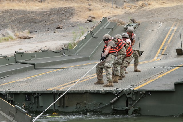 California Guard build temporary bridge for fire fighting effort