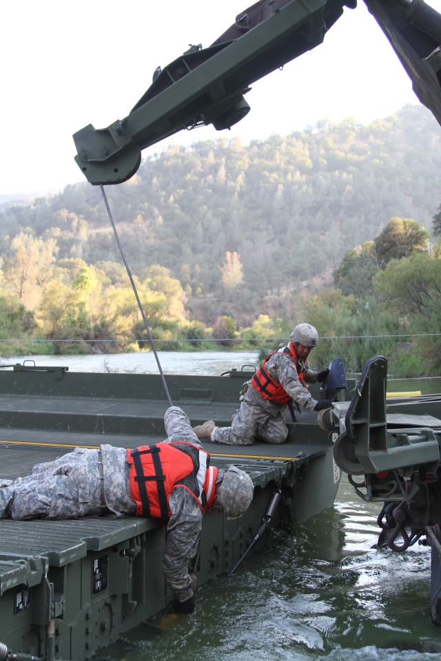 California Guard build temporary bridge for fire fighting effort