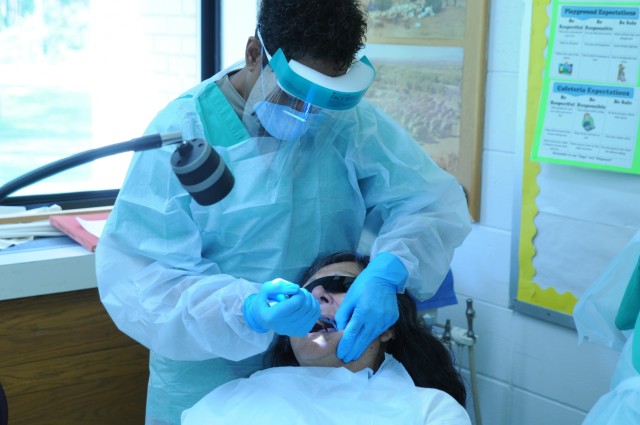 Army Reserve Soldiers conduct Medical IRT clinic at Bug-O-Nay-Ge-Shig School