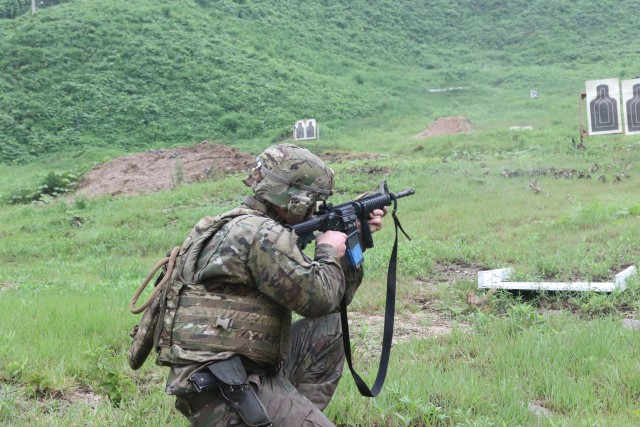 Soldier fires his M4 Carbine Rifle during the stress shoot event of the 2018 Eighth Army Best Medic Competion