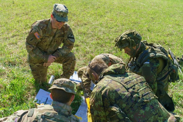 Air Cav Blackhawk pilots coordinate air assets for Operation Hedgehog