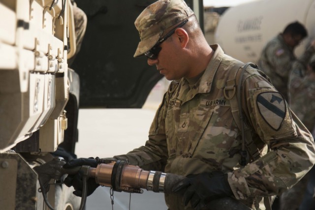 Pledging Allegiance; From Iraqi Interpreter to U.S. Soldier to American Citizen