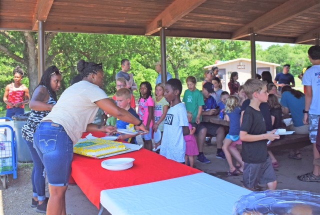 Staff and families from Fort Riley's Chaplaincy Corps and Religious Services Unit gathered July 19 at Moon Lake at Fort Riley to recognize the role chaplains have had in the U.S. Army for 243 years.