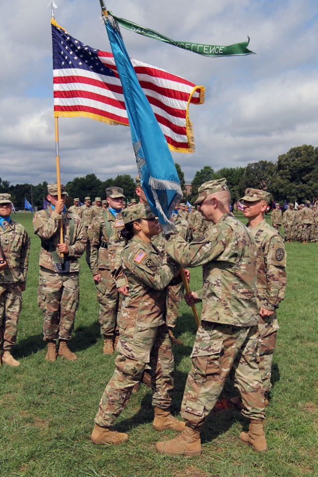 Lt. Col. Nally accepts the Bn. Colors from Col. Vile