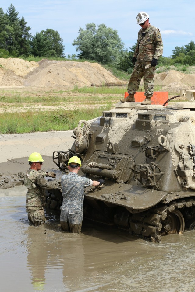Students build skills in tracked vehicle recovery during RTS-Maintenance course at Fort McCoy