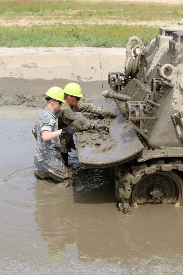 Students build skills in tracked vehicle recovery during RTS-Maintenance course at Fort McCoy