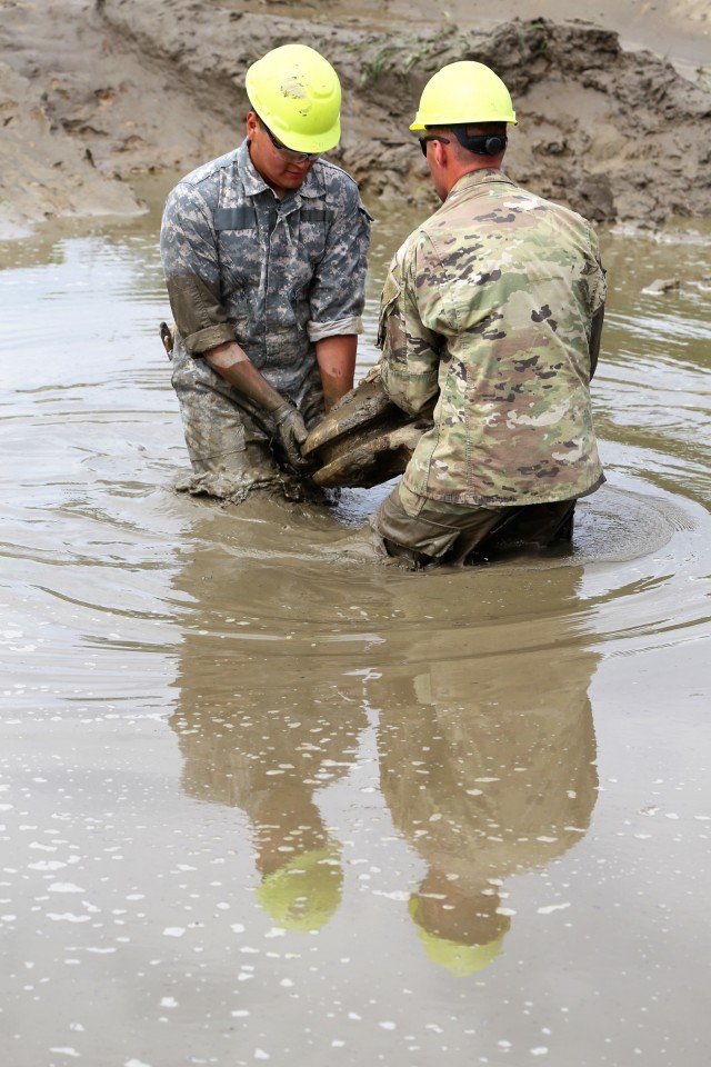 Students build skills in tracked vehicle recovery during RTS-Maintenance course at Fort McCoy