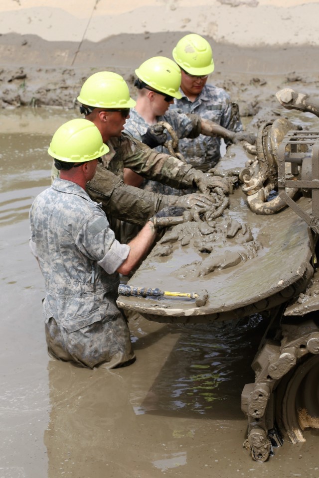 Students build skills in tracked vehicle recovery during RTS-Maintenance course at Fort McCoy