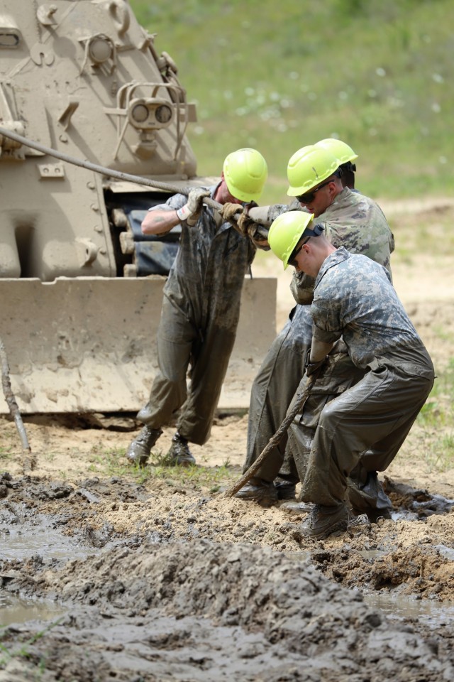 Students build skills in tracked vehicle recovery during RTS-Maintenance course at Fort McCoy