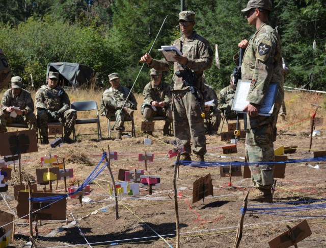Soldiers from 4th Battalion, 23d Infantry and Charger Company, 1st Battalion, 5th Infantry Regiment Conduct a Combined Arms Rehearsal during Courage Ready 18-02