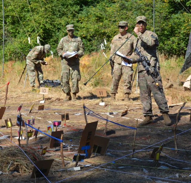 Soldiers from 4th Battalion, 23d Infantry and Charger Company, 1st Battalion, 5th Infantry Regiment Conduct a Combined Arms Rehearsal during Courage Ready 18-02