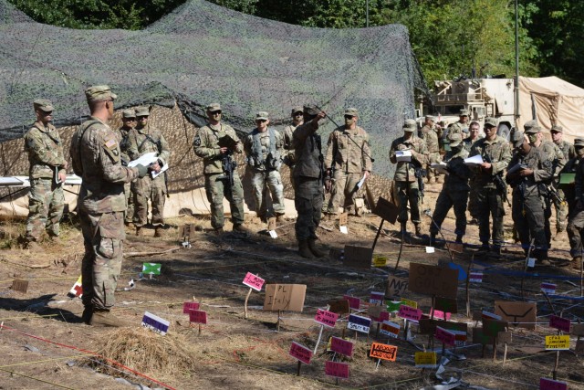 Soldiers from 4th Battalion, 23d Infantry and Charger Company, 1st Battalion, 5th Infantry Regiment conduct a combined arms rehearsal