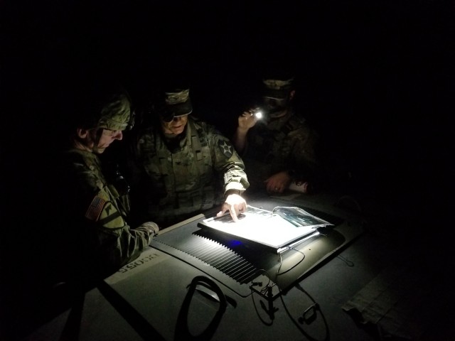 Lancer 6 Briefs an Operational Overview to Courage 6 during Emergency Deployment Readiness Exercise, Courage Ready 18-02