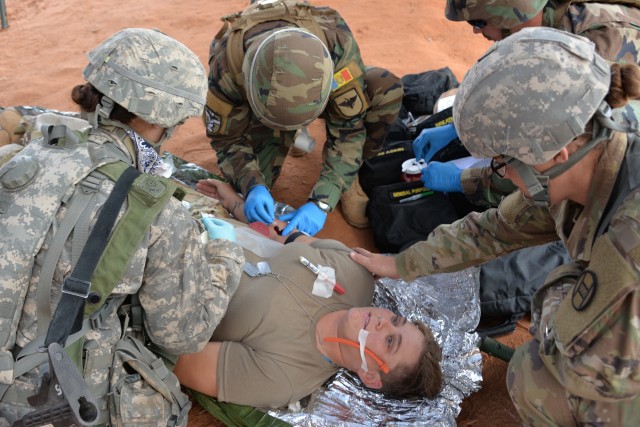 Combat medic soldiers with the 230th Brigade Support Battalion and Moldovan Combat Medics work together