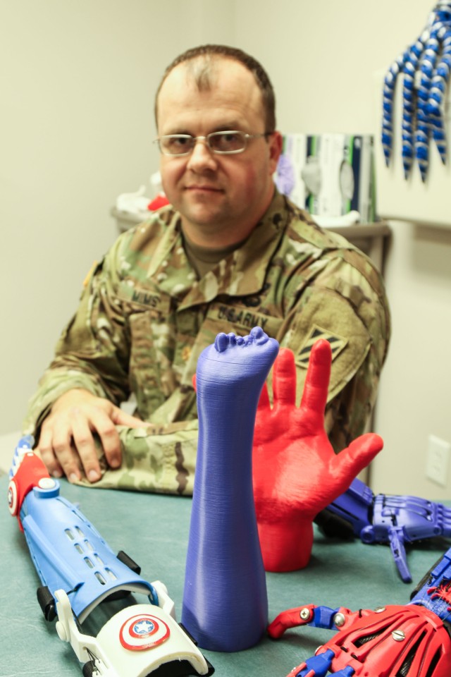 Surgeon gives hands on help to children