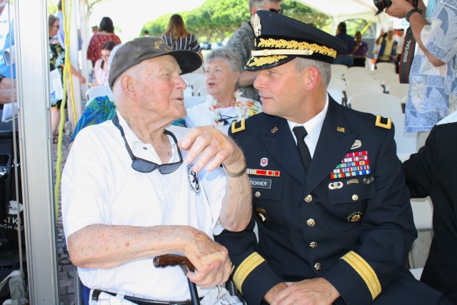 Brig. Gen. Tickner stands with veterans following memorial stone dedication