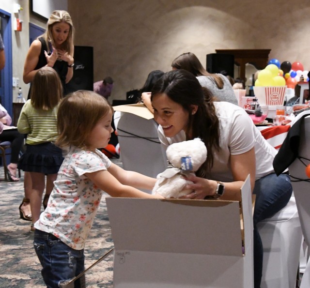 Fort Drum mothers-to-be showered with gifts at a party in their honor